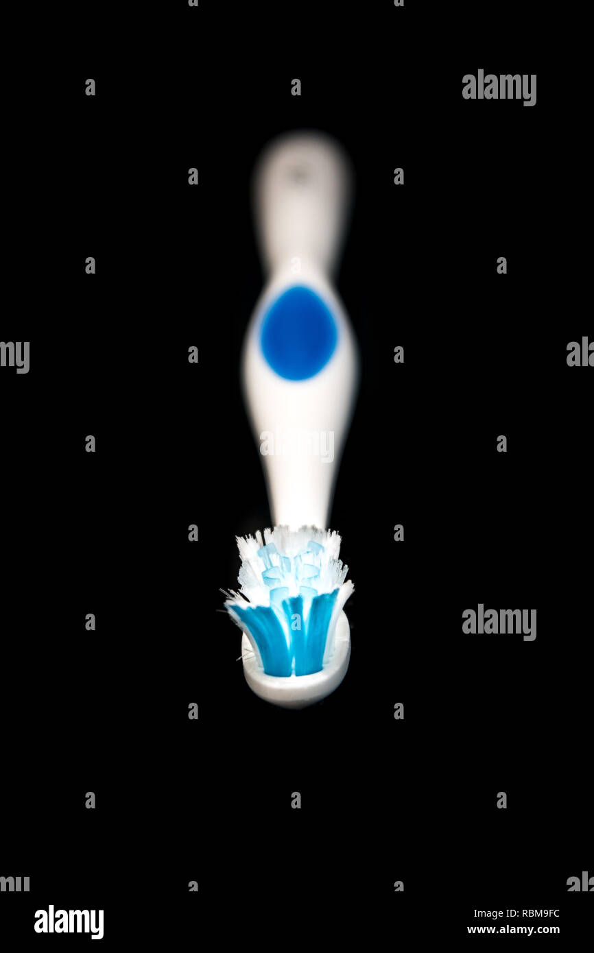 Toothbrush isolated on black background Stock Photo