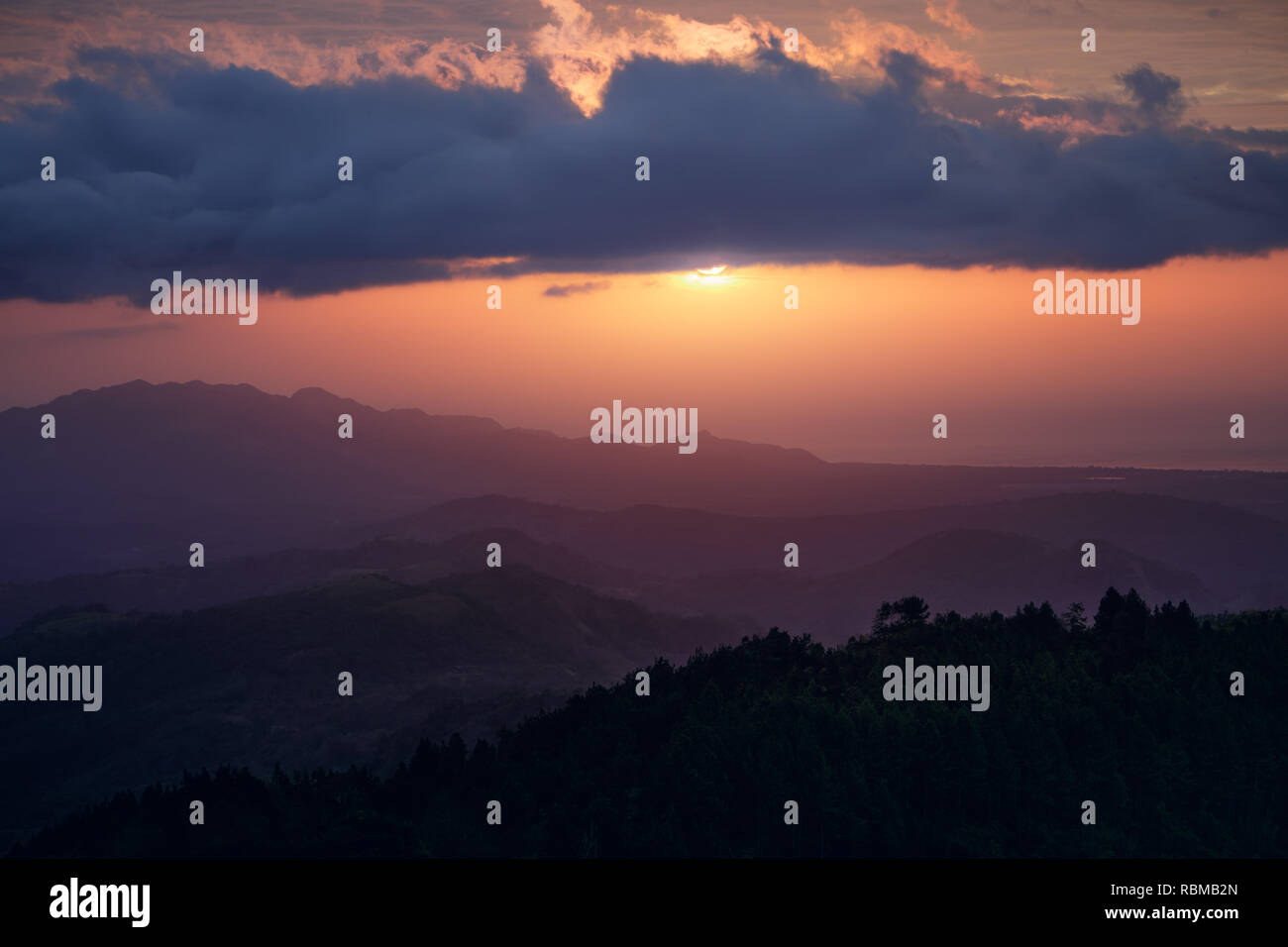 Stunning Sunrise up in the mountains of Altos del Maria in Sora, Panama. Stock Photo