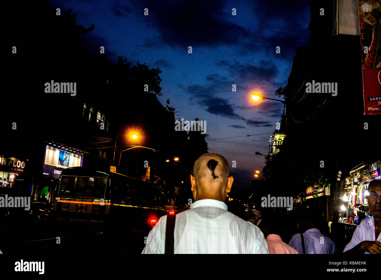 Brahmin walking on Mahatma Gandhi Road, Kolkata, West Bengal, India, Asia Stock Photo