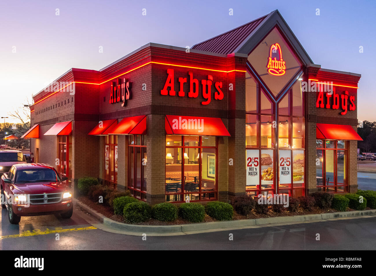 Arby's restaurant at sunset on Atlanta Highway in Loganville, Georgia. (USA) Stock Photo
