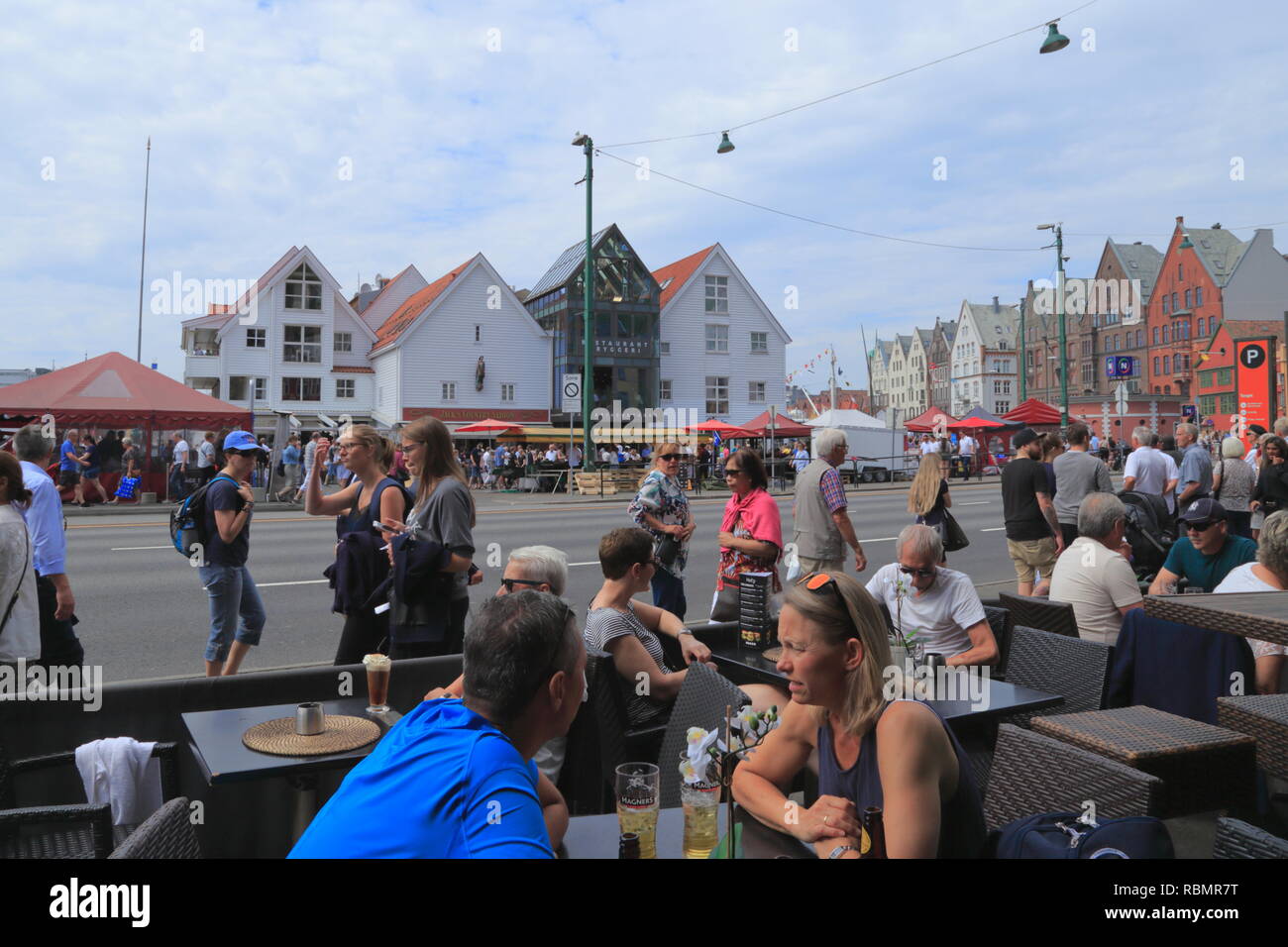 People visit Bergen city in Norway, on the traditional Market Day (Torgdagen) during the summer. Stock Photo