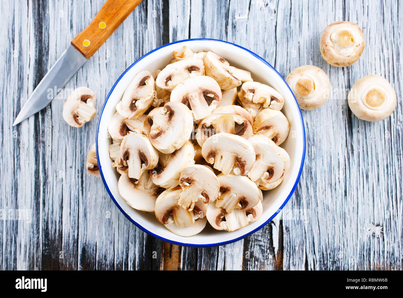 raw mushrooms in bowl, mushrooms redy for cooking Stock Photo