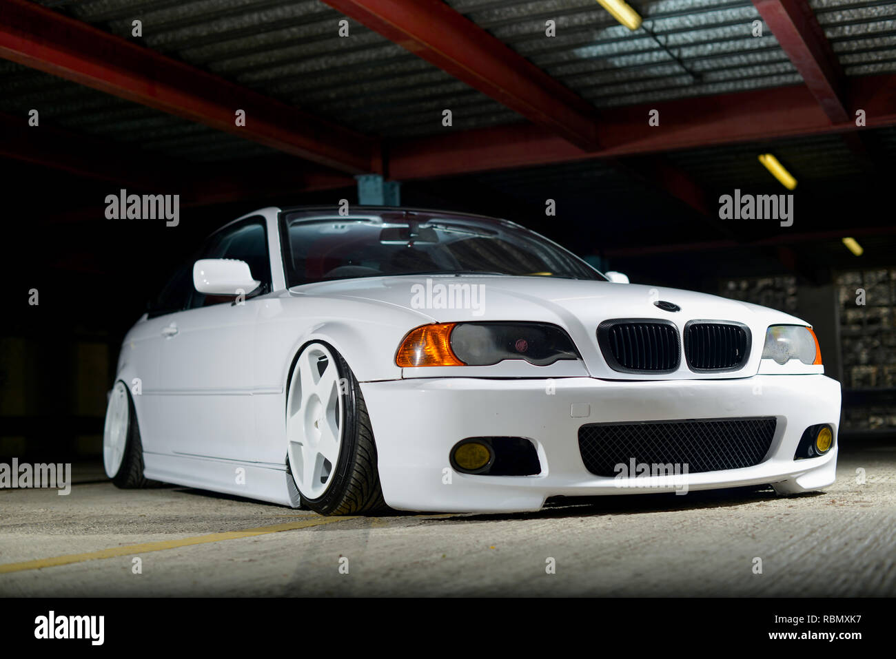 Stanced BMW E46 3 series lowered on air bag suspension and modified Stock  Photo - Alamy