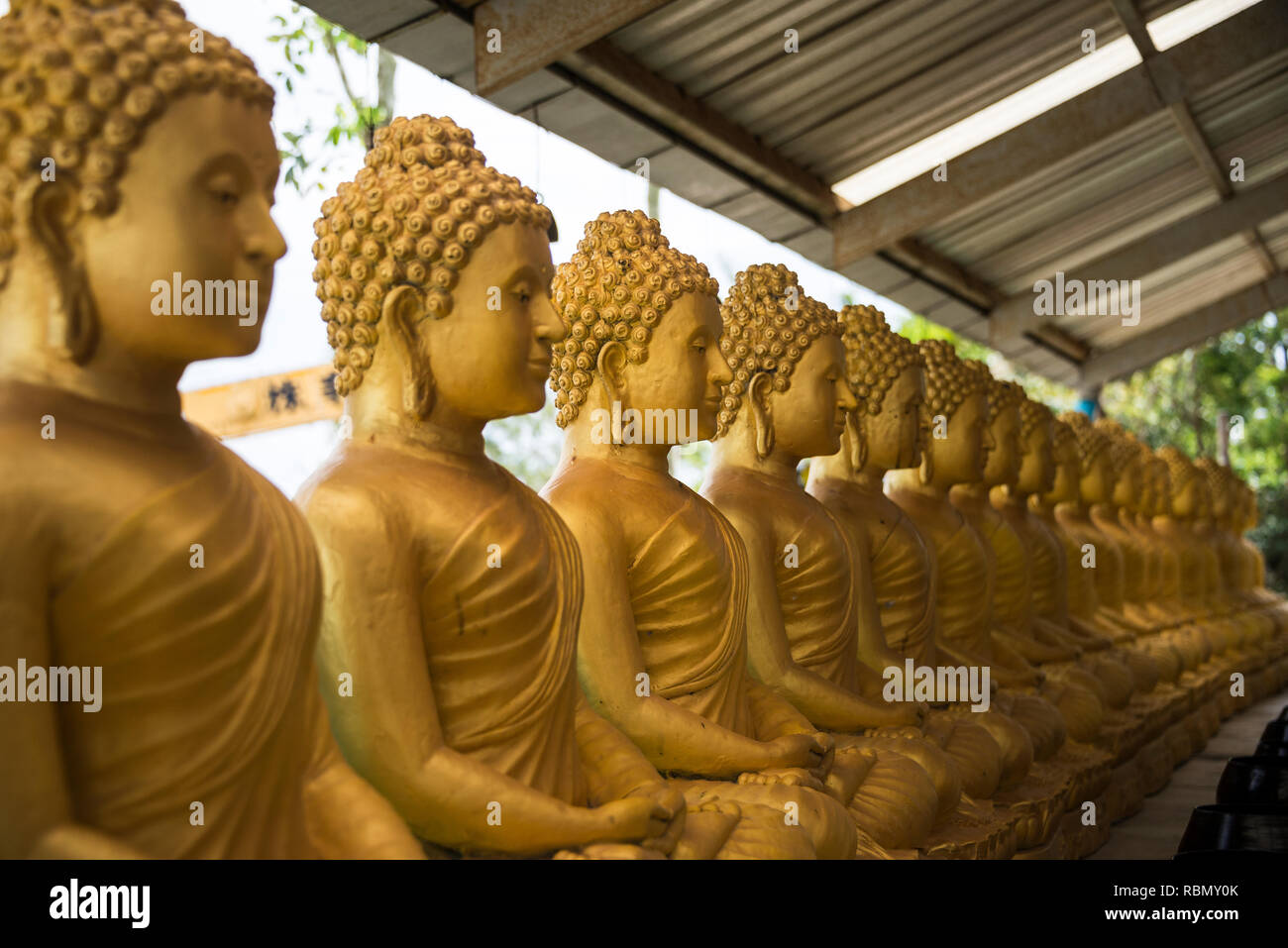 Golden statues on the island of Phuket Thailand. Day 19 December 2018 Stock Photo