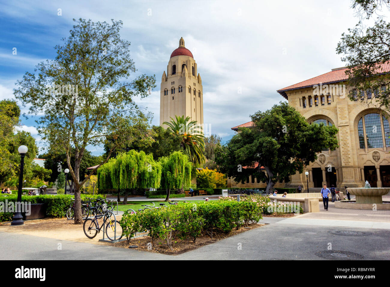 PALO ALTO, USA - OCTOBER, 2013: Hoover tower and green trees in Stanford University campus Stock Photo