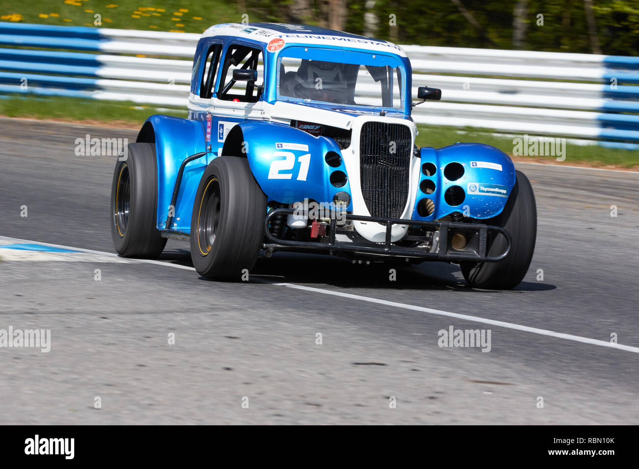 HÄMEENLINNA, FINLAND – APRIL 11 2016: A classic racecar at high speed on racetrack on open practise day at Ahvenisto Race Circuit in Finland. This was Stock Photo
