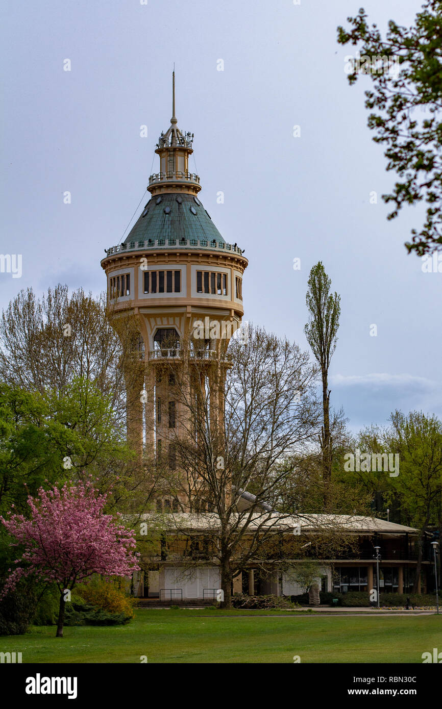 On Margaret Island in Budapest, Hungary is a historic water tower surrounded by trees Stock Photo