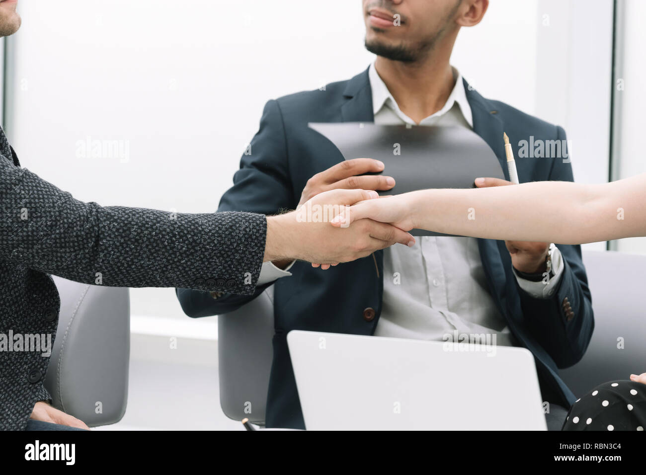 handshake of business partners after drawing up the contract Stock Photo