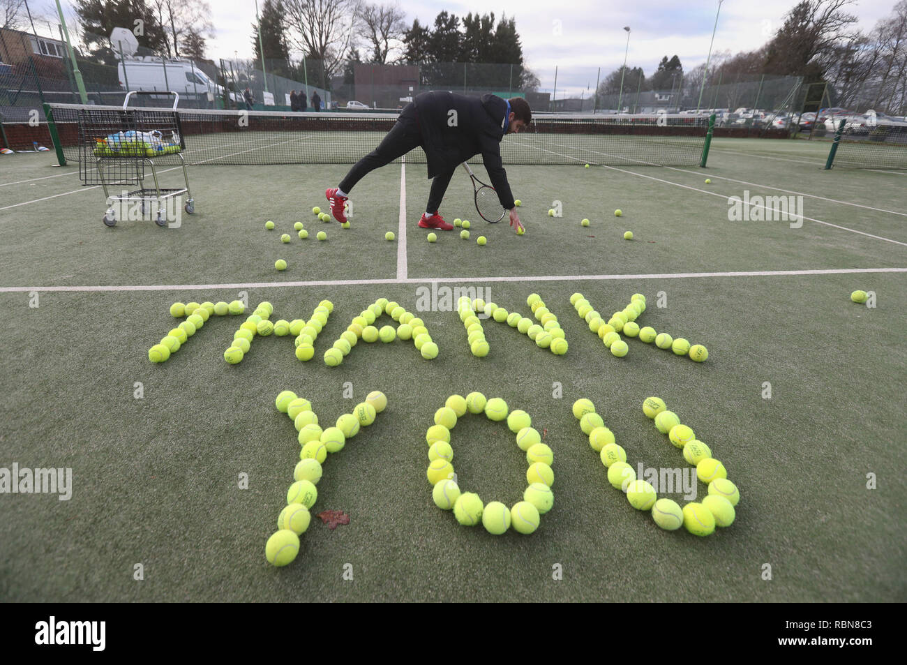 Tennis coach Josh Thomson with tennis balls laid out at Dunblane Tennis Club in Andy Murray's home town, he has said he is aiming to end his career after Wimbledon but the Australian Open may be his last tournament. Stock Photo