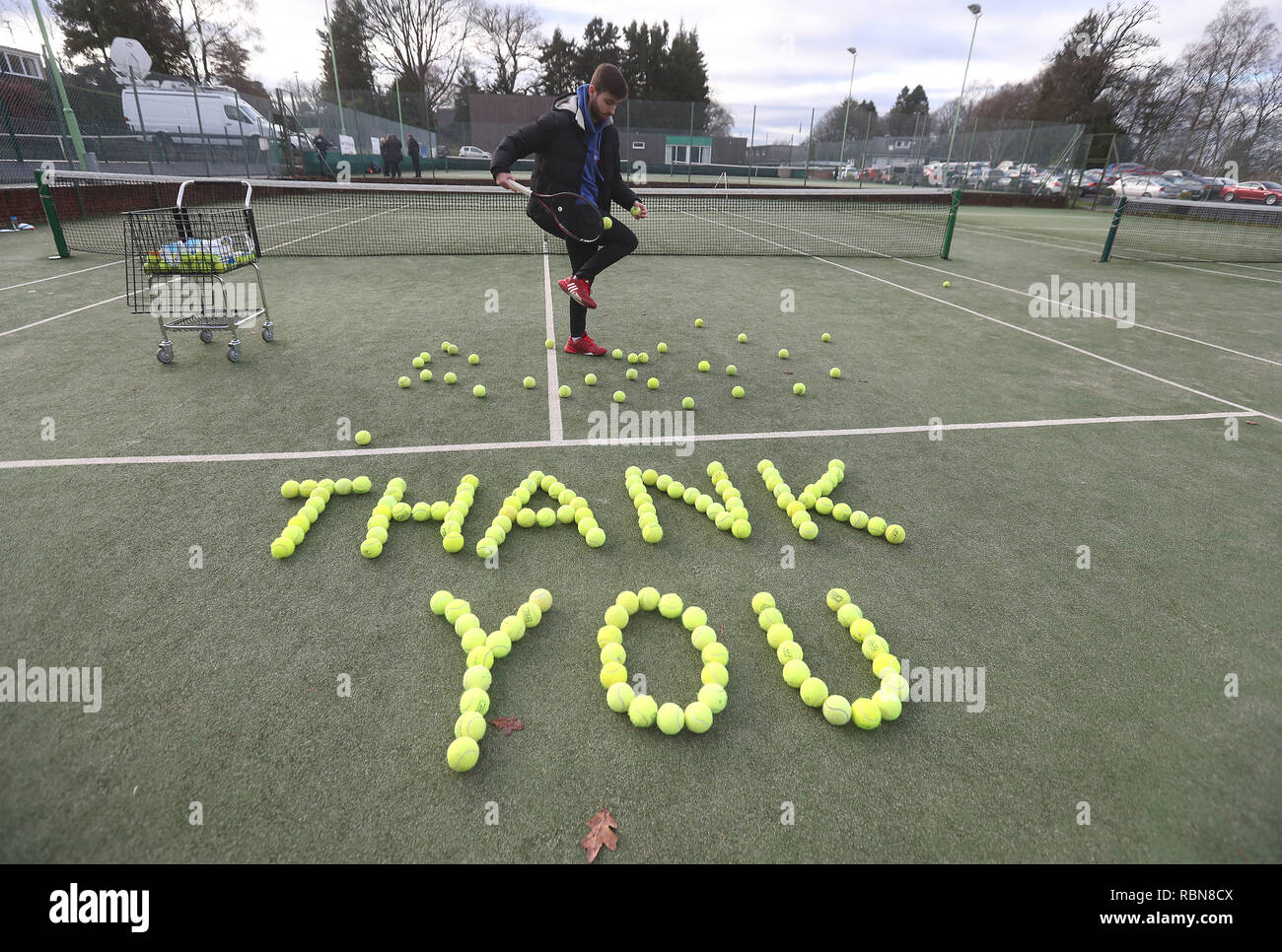 Tennis coach Josh Thomson with tennis balls laid out at Dunblane Tennis Club in Andy Murray's home town, he has said he is aiming to end his career after Wimbledon but the Australian Open may be his last tournament. Stock Photo