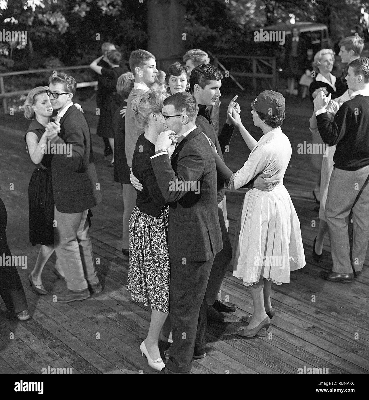 Dancing in the 1950s. A nice outdoor summer dance event where young couples are dancing and having fun. Sweden 1958. Ref BV104-4 Stock Photo