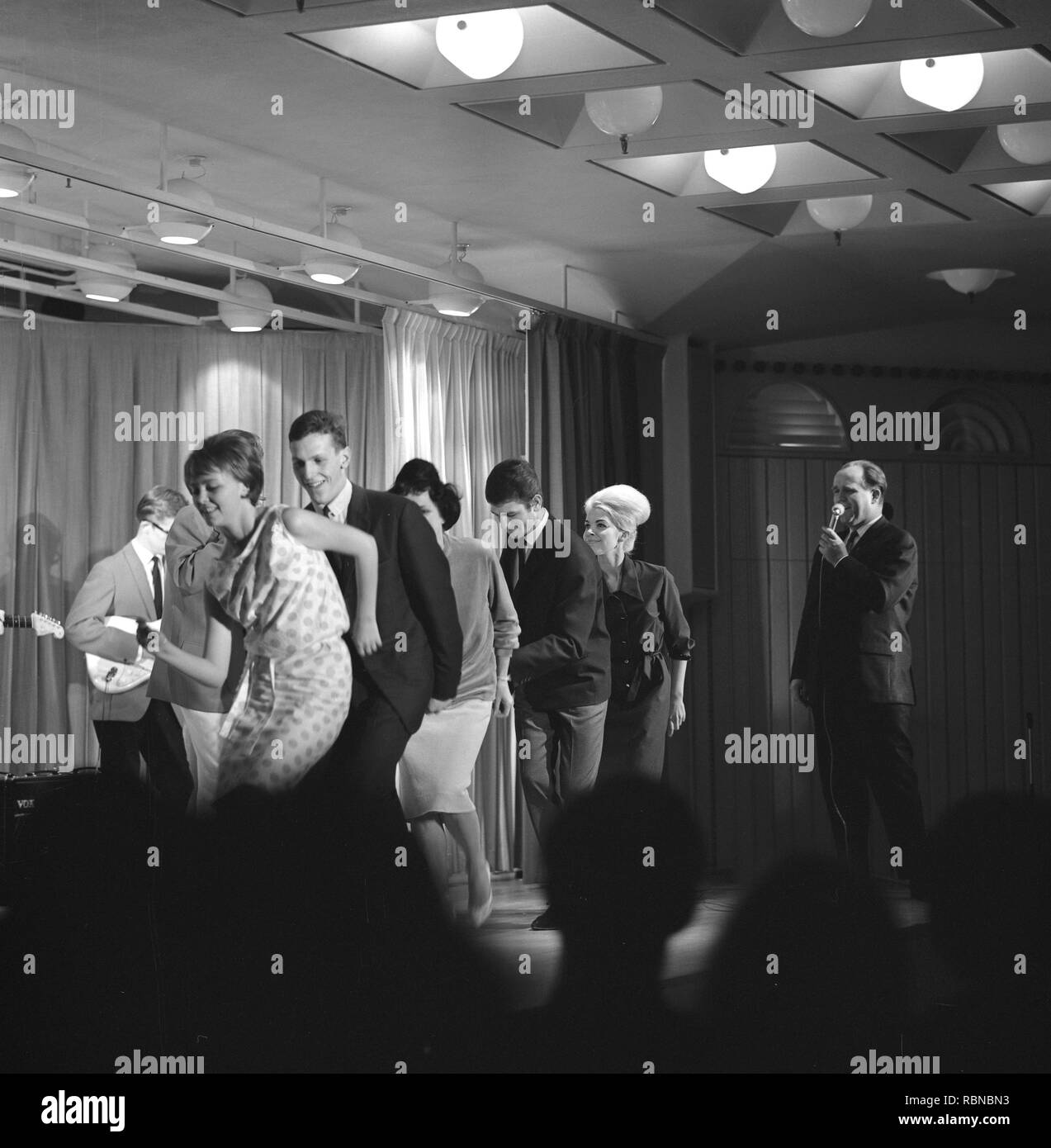 Dancing in the 1960s. The dance Hully Gully is being made popular and