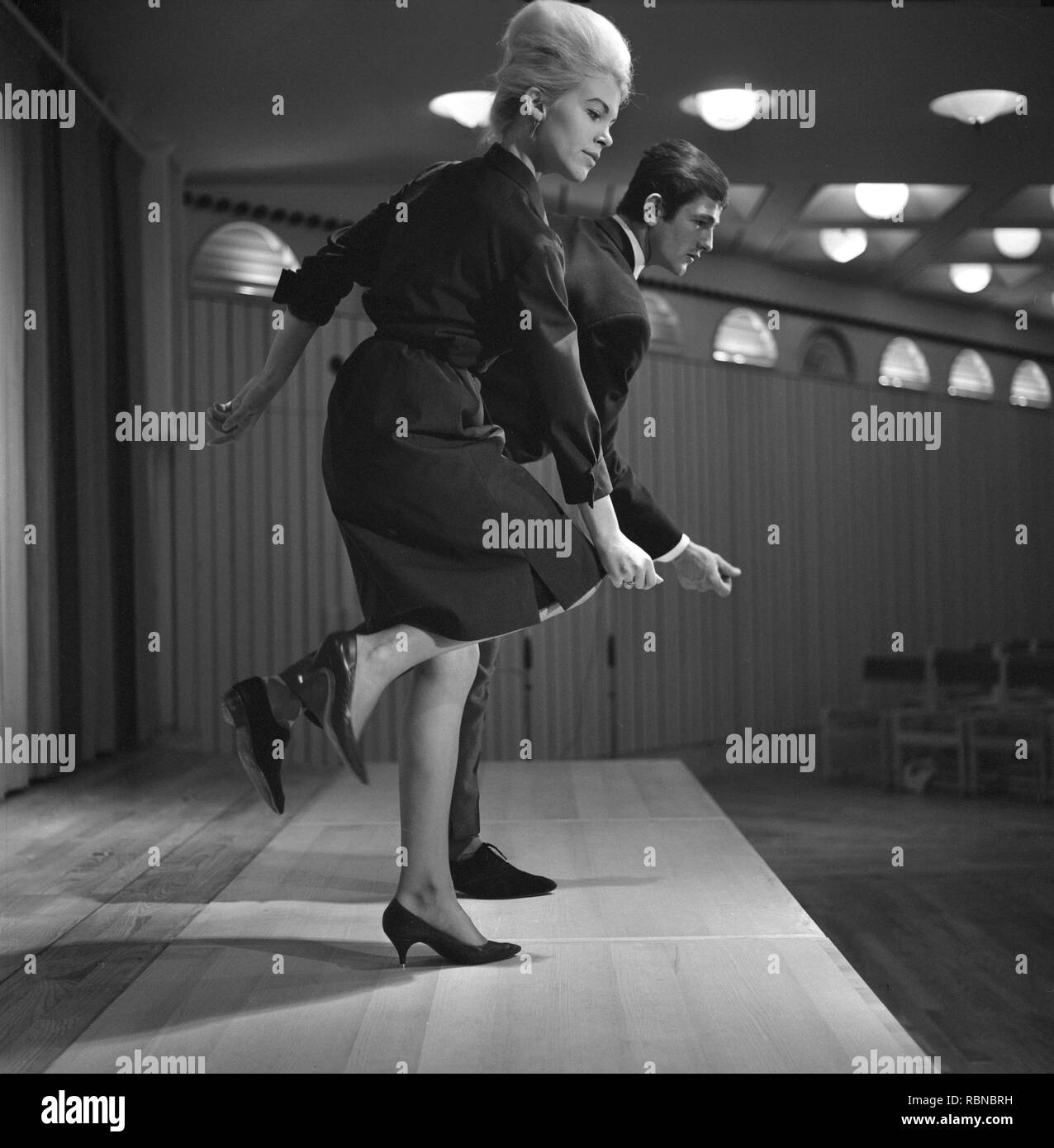 Dancing in the 1960s. The dance Hully Gully is being made popular and