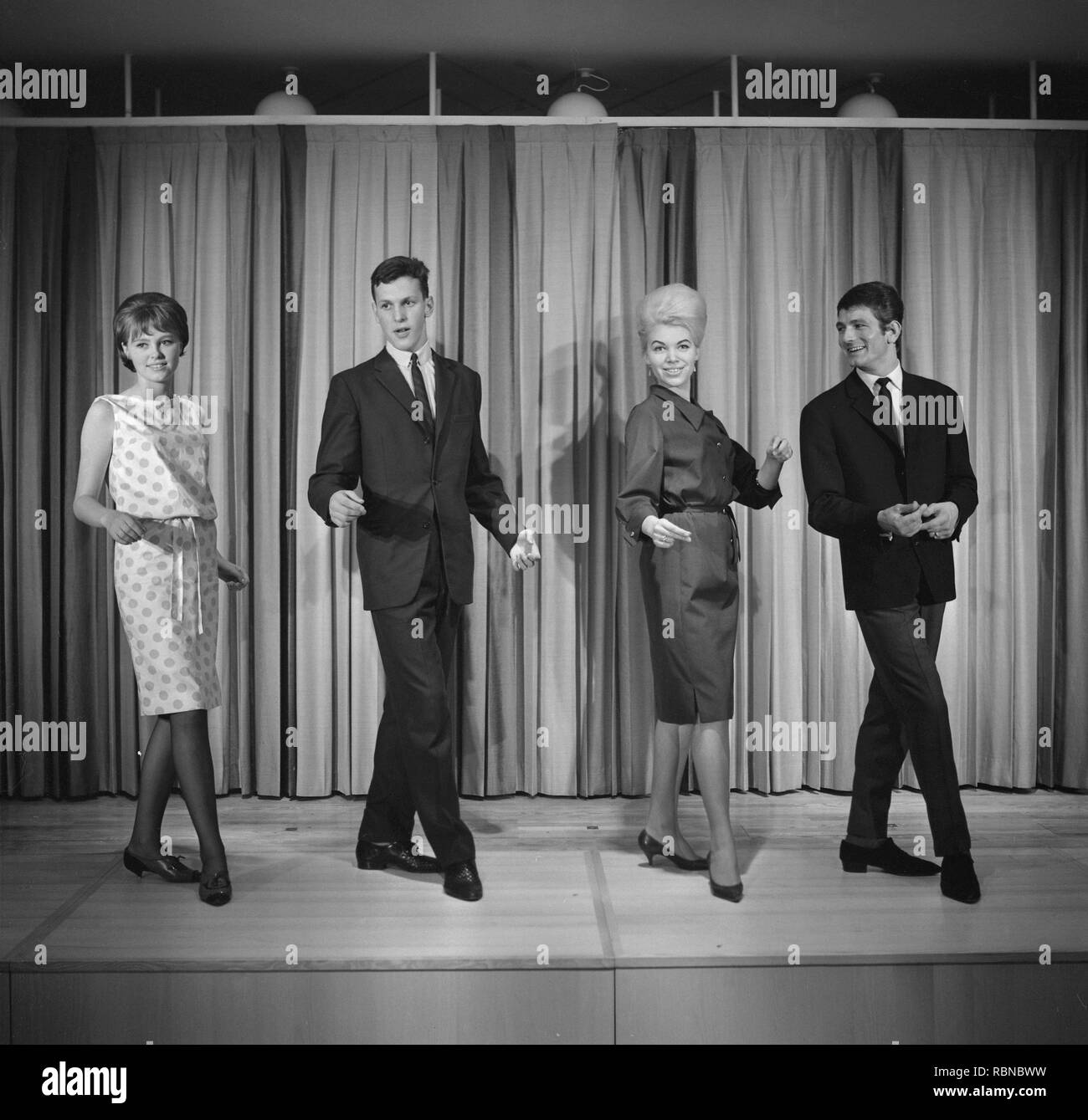 Dancing in the 1960s. The dance Hully Gully is being made popular and