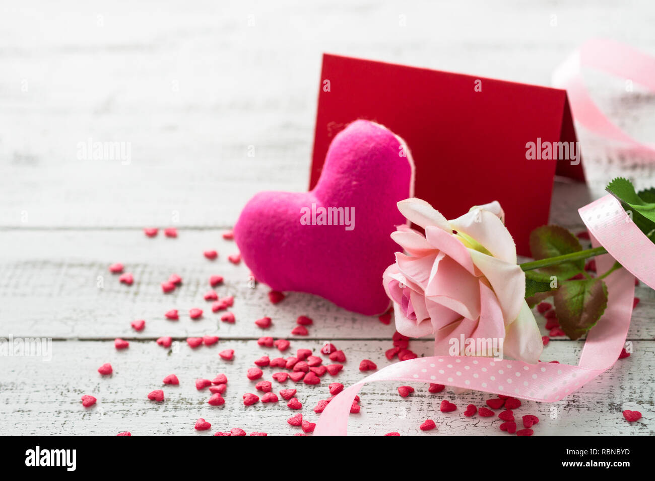 Valentines day background. Pink heart, rose and greeting card. Love ...