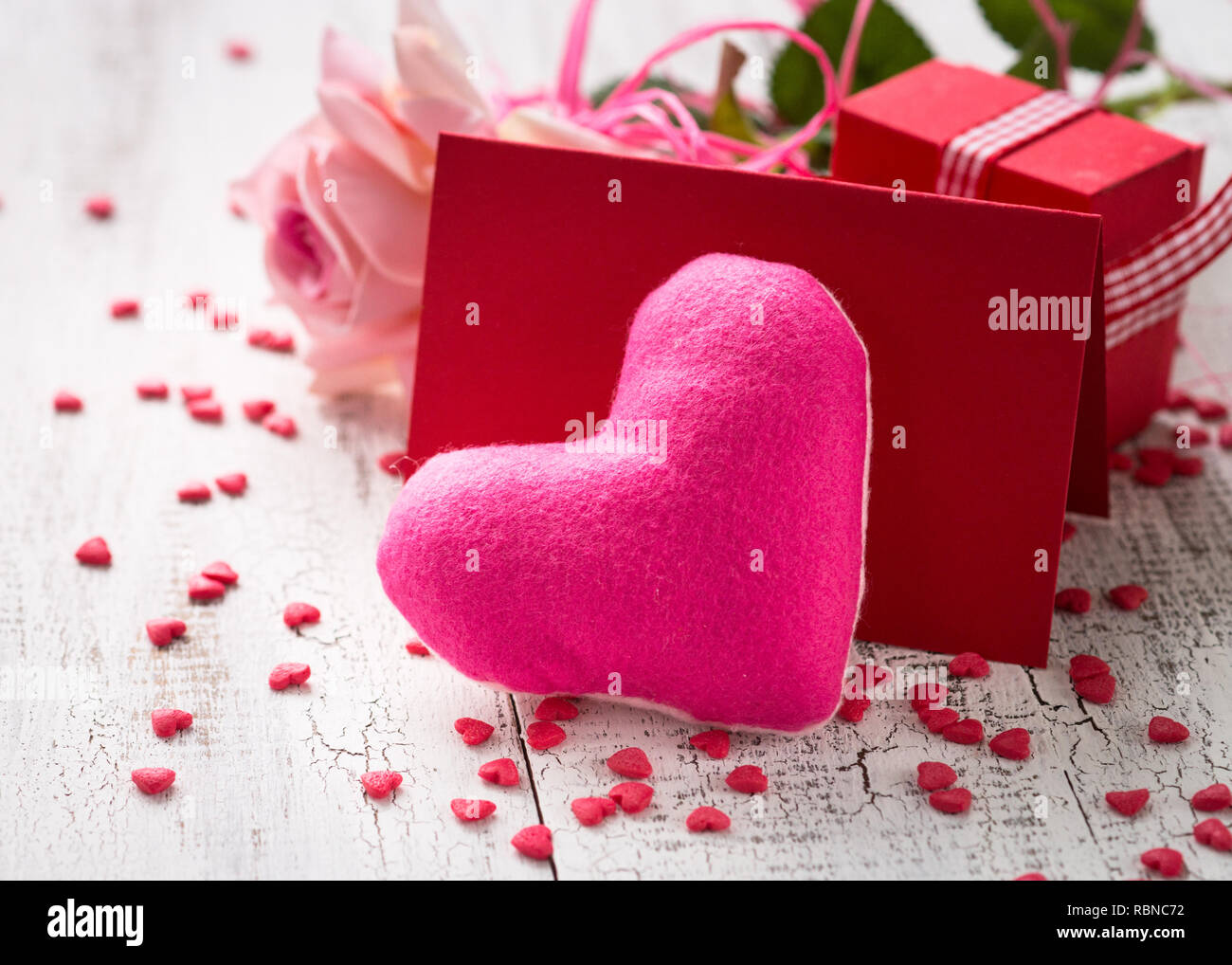 Valentines day background. Pink heart, rose and present. Love symbol Stock  Photo - Alamy