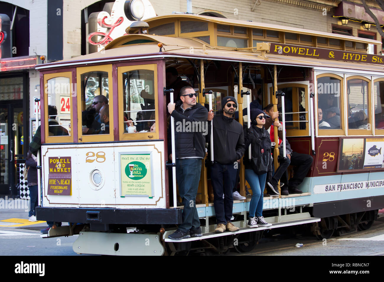 People ride the world famous cable car in San Francisco, USA Stock Photo -  Alamy
