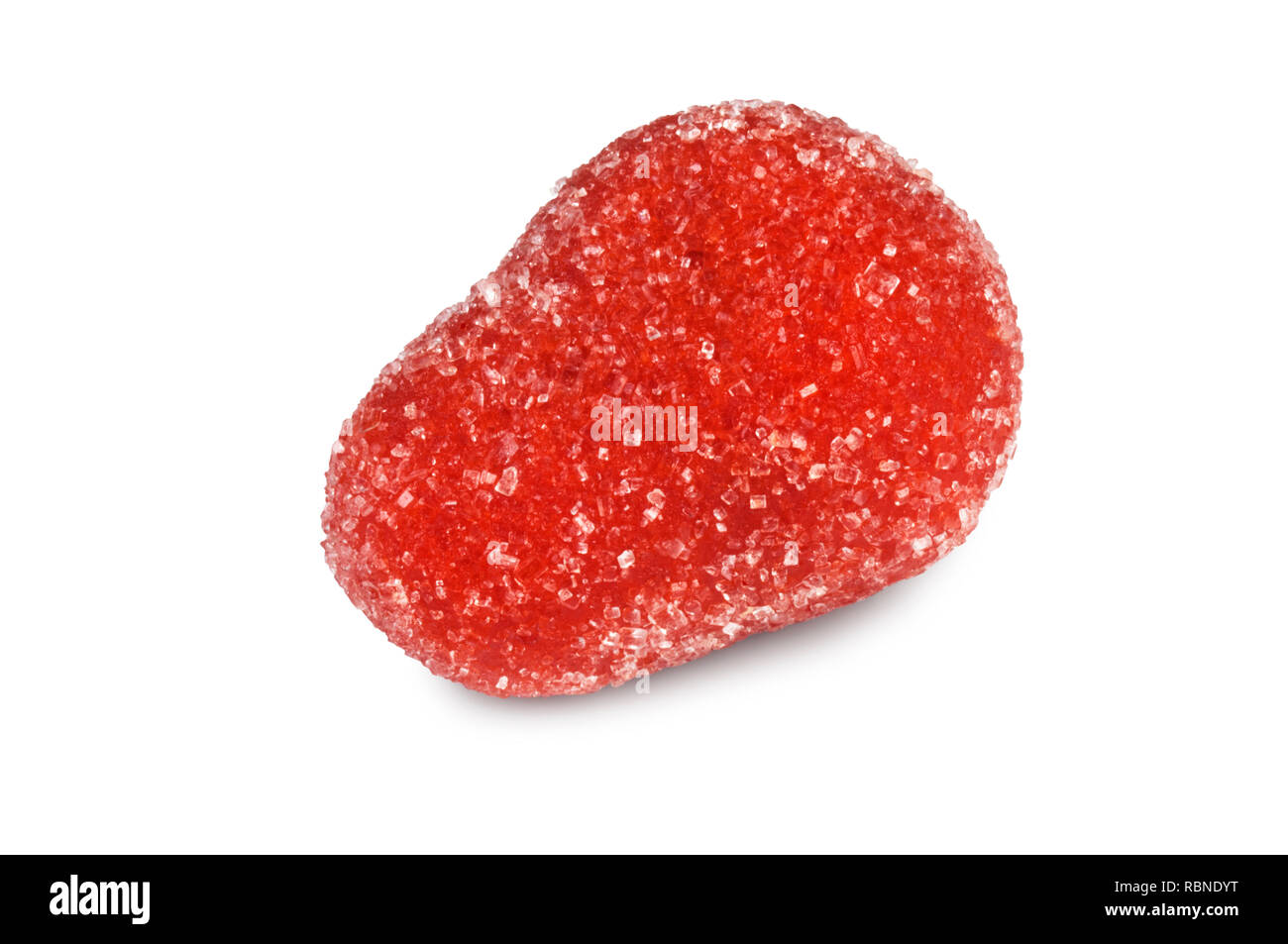 Studio shot of a single marzipan sweet isolated on a white background - John Gollop Stock Photo