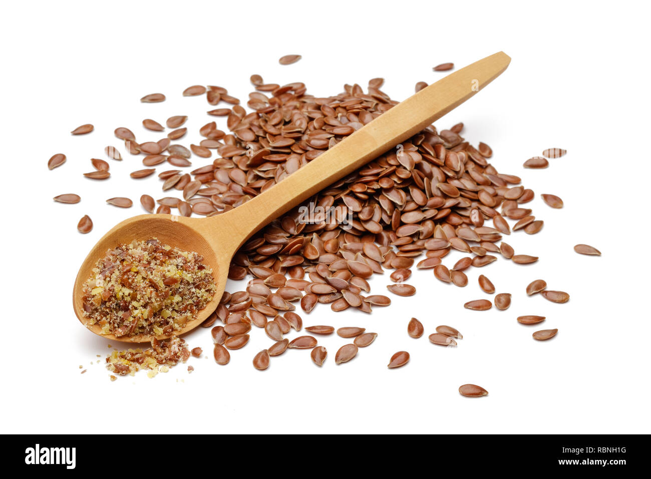 Flax seeds and granule flax seeds in wooden spoon isolated on white