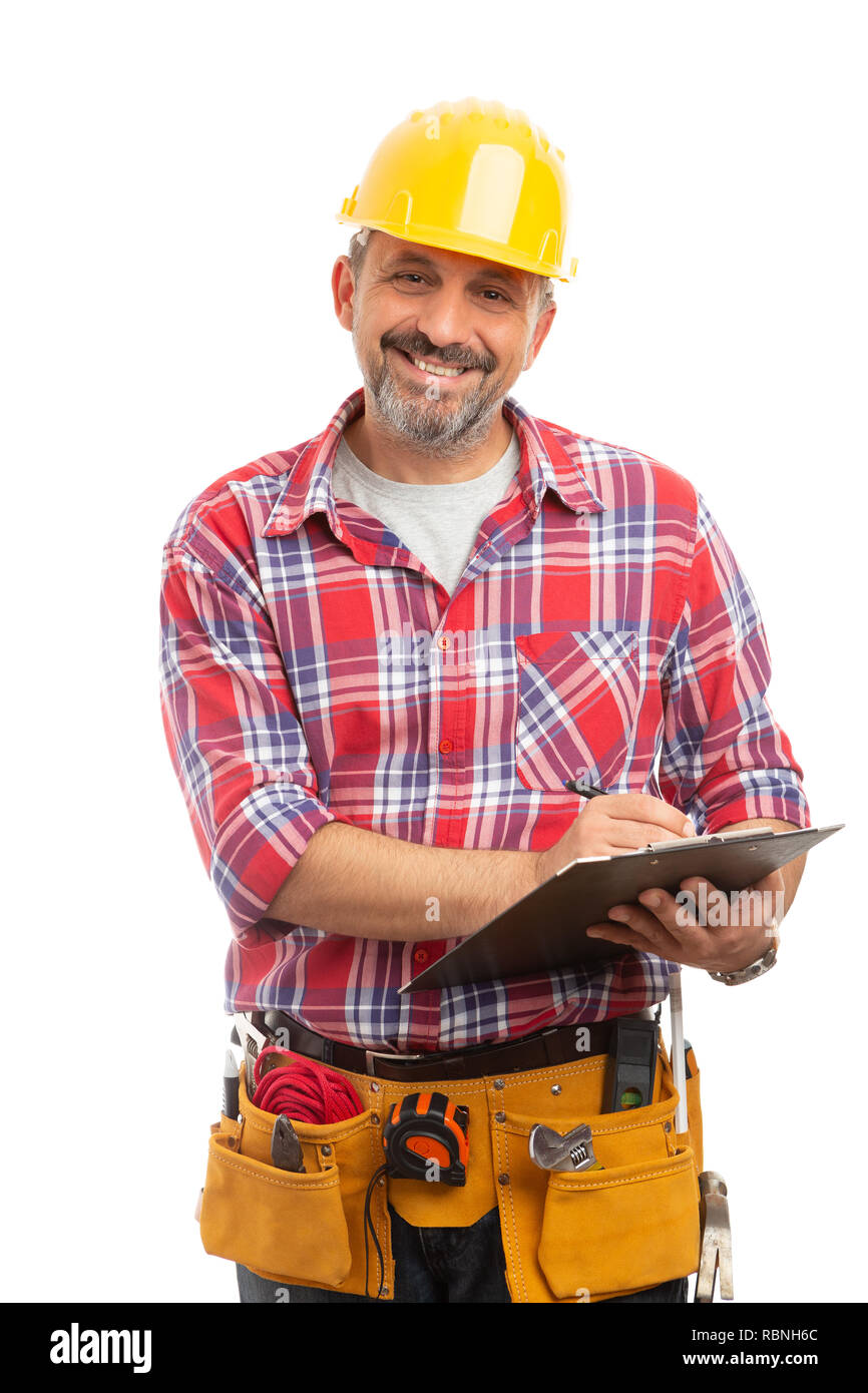 Friendly constructor smiling as taking notes on clipboard isolated on white studio background Stock Photo