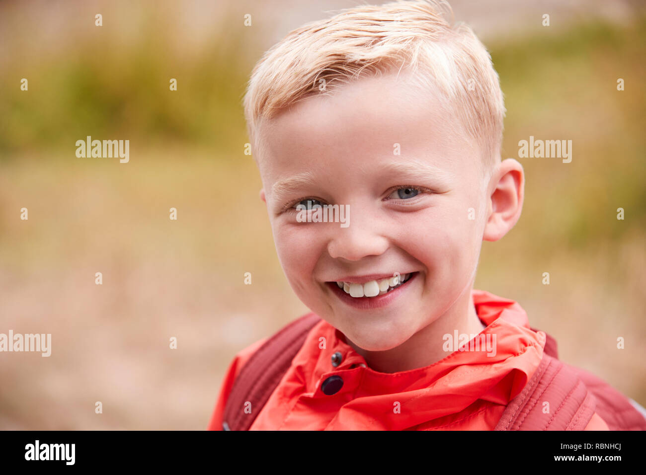 Portrait of pre-teen Caucasian boy outdoors, front view Stock Photo