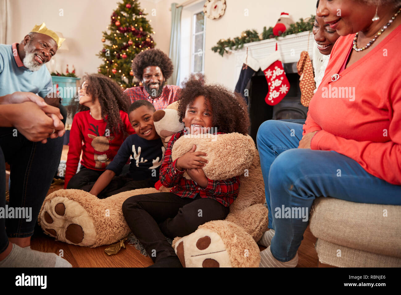 Children Playing With Giant Teddy Bear 
