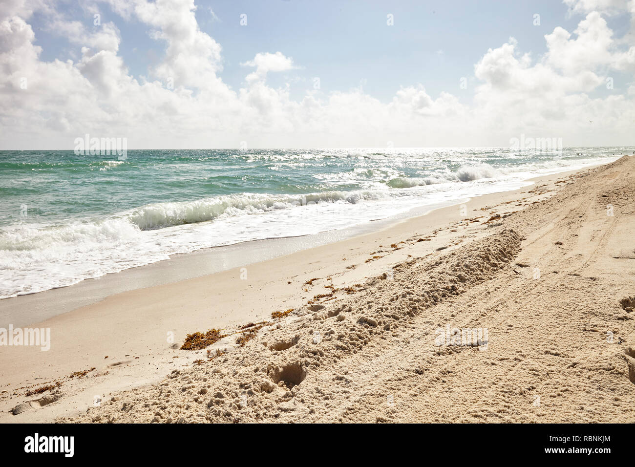 Ocean Waves Breaking On Empty Sandy Spanish Beach Stock Photo