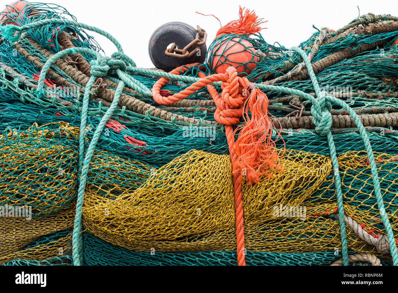 confusion of multicolored fishing nets Stock Photo