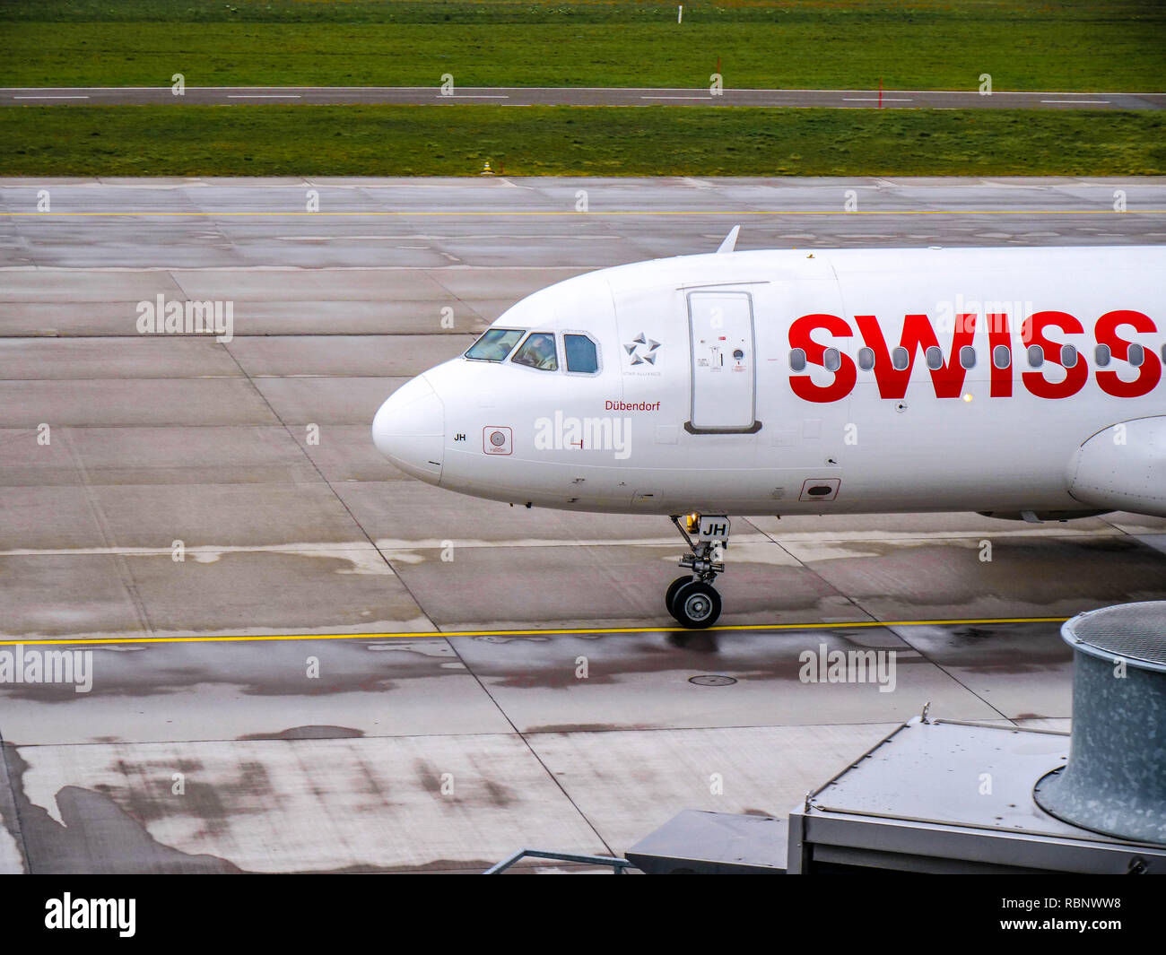 Swiss plane at Zürich airport, Switzerland Stock Photo - Alamy