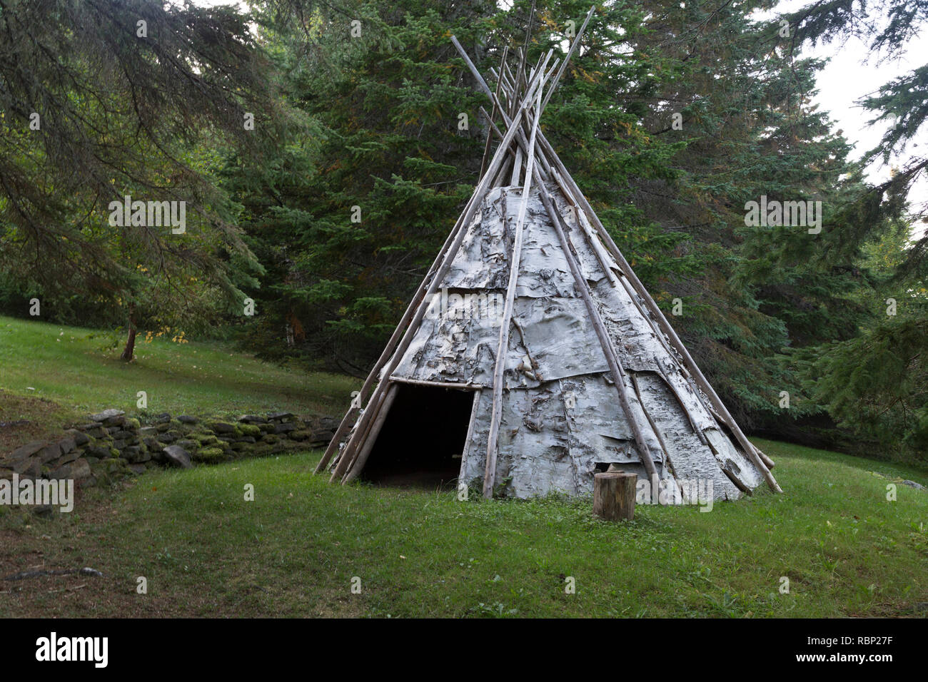 Traditionally created birch bark tipi at the Micmac Interpretation Site of Gespeg at Gaspé in Quebec, Canada. The Mi'gmaw (or Mi'kmaq) people were the Stock Photo