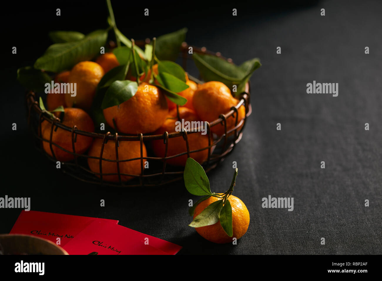 Red envelopes, gold envelopes and Tangerine and mandarin orange for Lunar New Year Stock Photo