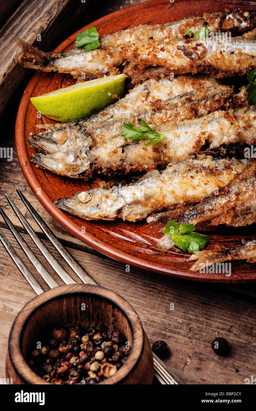 Fried small fish crispy deep hi-res stock photography and images - Alamy