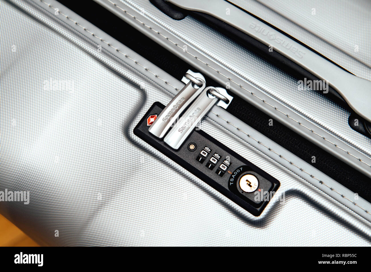 PARIS, FRANCE - JAN 22, 2018: Closeup detail of a Samsonite suitcase  briefcase with focus on the logo and TSA combination lock password number  Stock Photo - Alamy