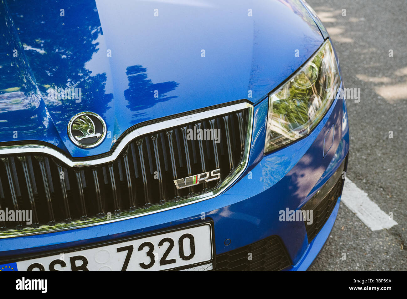 PARIS, FRANCE - APR 21, 2017: Macro detaly with the logo of the new blue metallic sport Skoda Octavia Wagon VRS car parked on the street of Paris on a sunny day Stock Photo