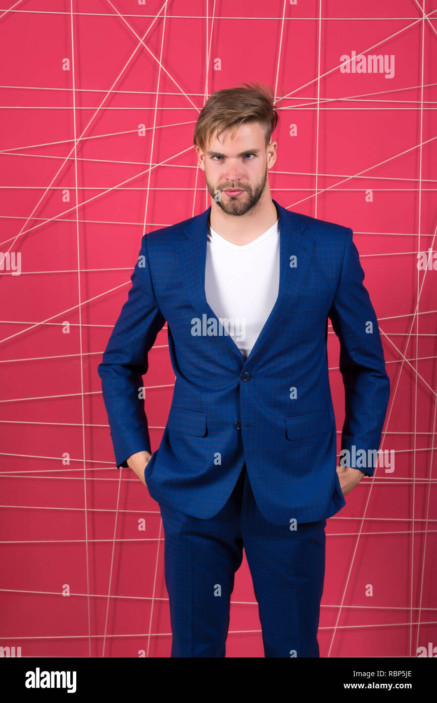 Proper outfit influence reputation in society. Man or businessman wear  classic dark blue suit. Menswear and stylish wardrobe concept. Male fashion.  Man formal clothing looks handsome and confident Stock Photo - Alamy