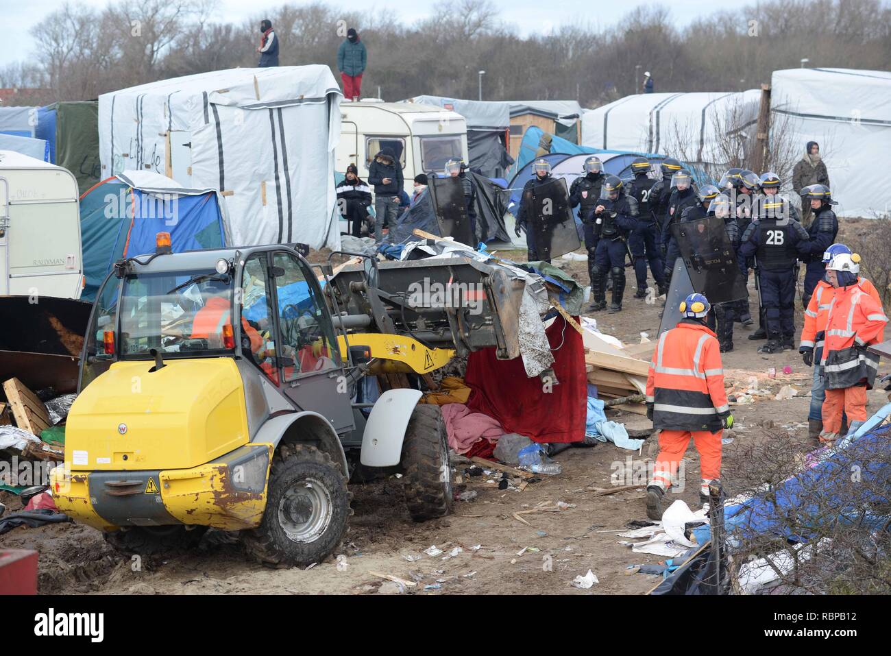 Workers begin to clear the southern section of the Calais Jungle in Calais, France Where Calais