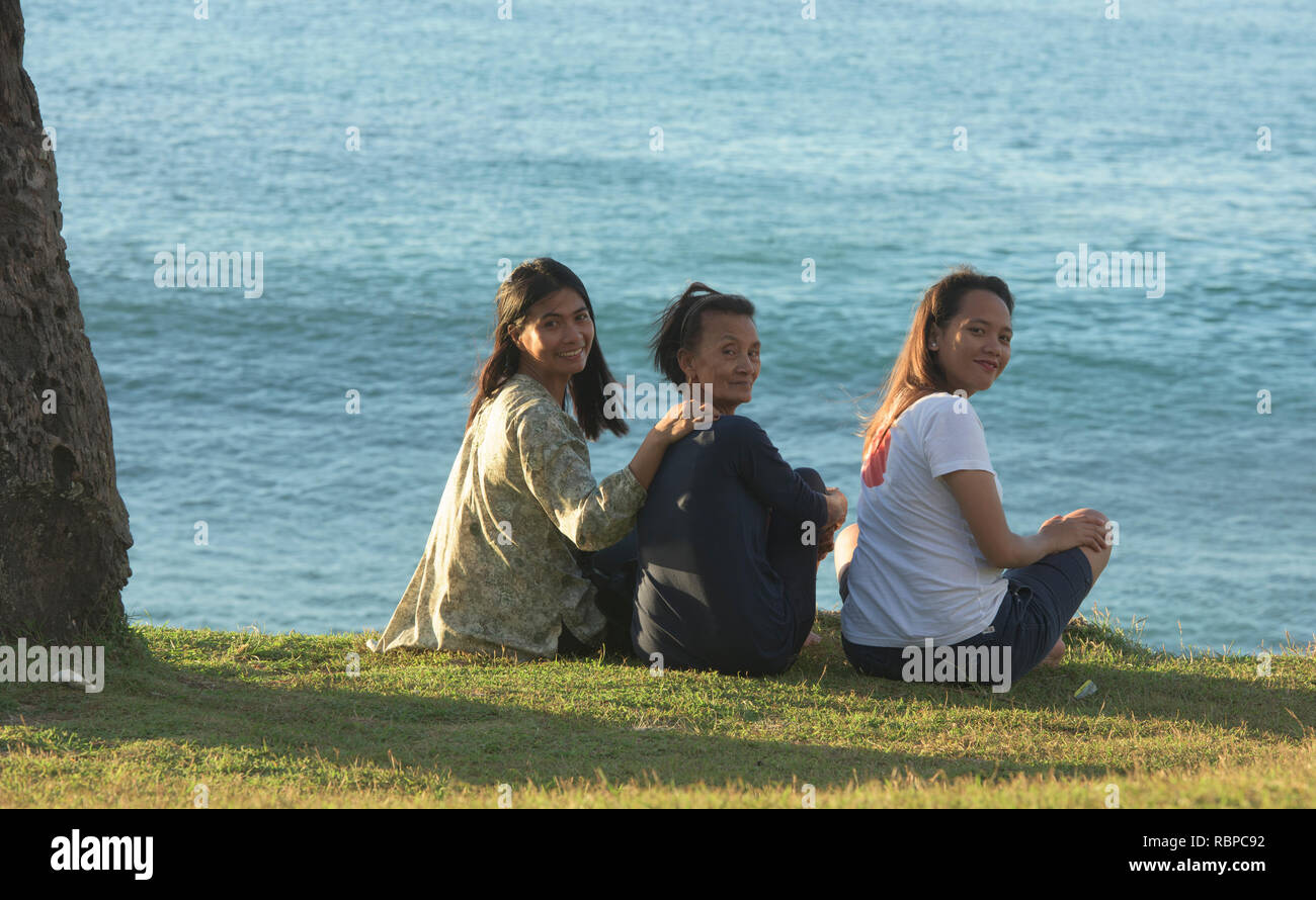 Mother, daughter, and niece, Pagudpud, Luzon, Philippines Stock Photo