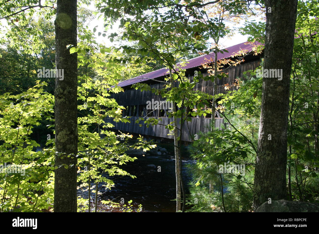 View of Albany Covered Bridge spanning Swift River, New Hampshire USA