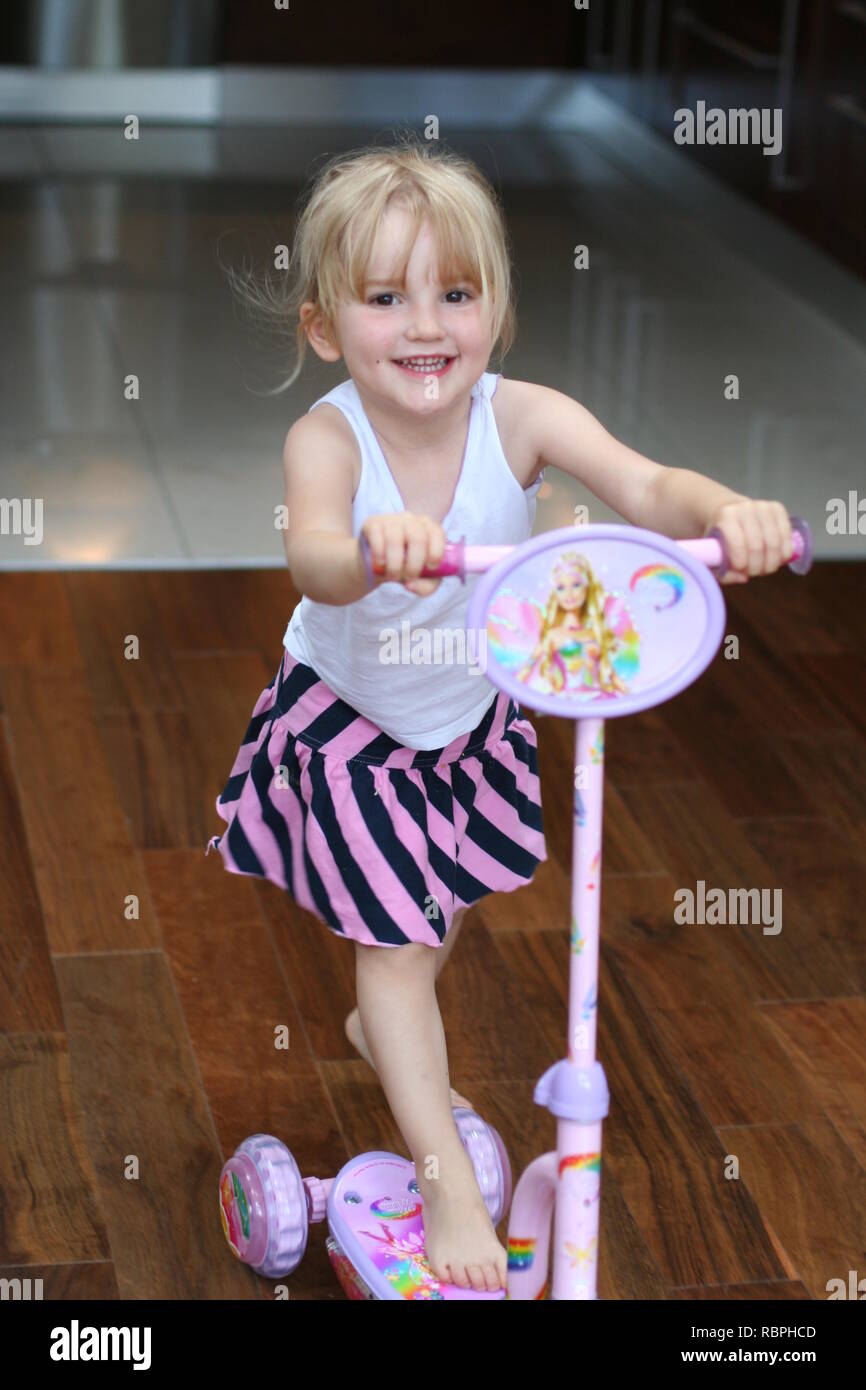 Little Blonde Hair Brown Eyes 4 Year Old Child Girl Kid On A