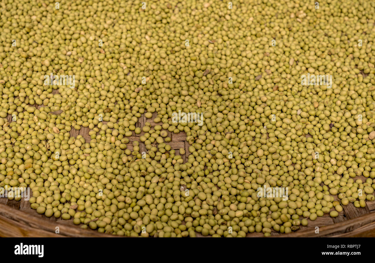 Green split peas drying inside Tulou in Fujian Province Stock Photo Alamy