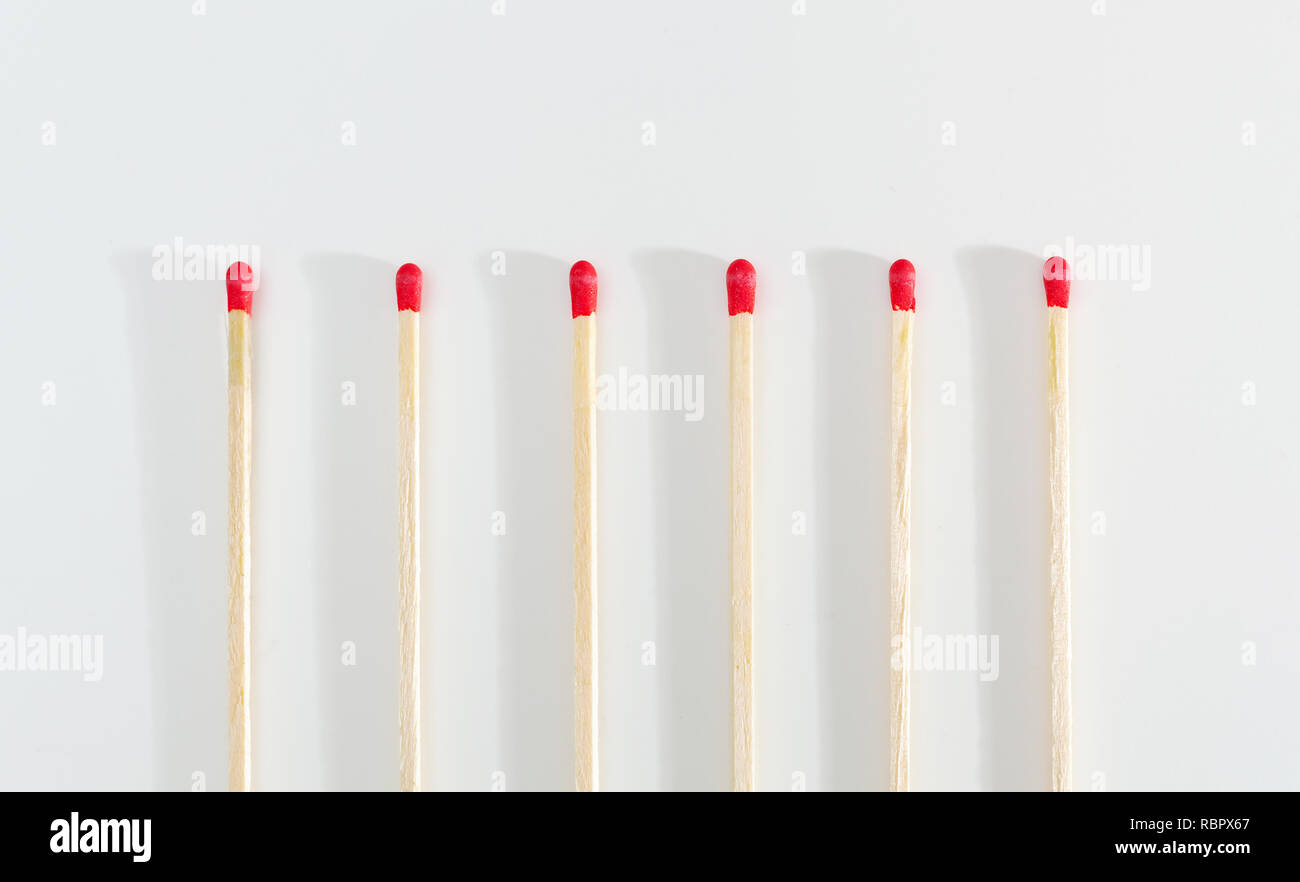 Many matches sticks for lighting a fire on white background. Stock Photo