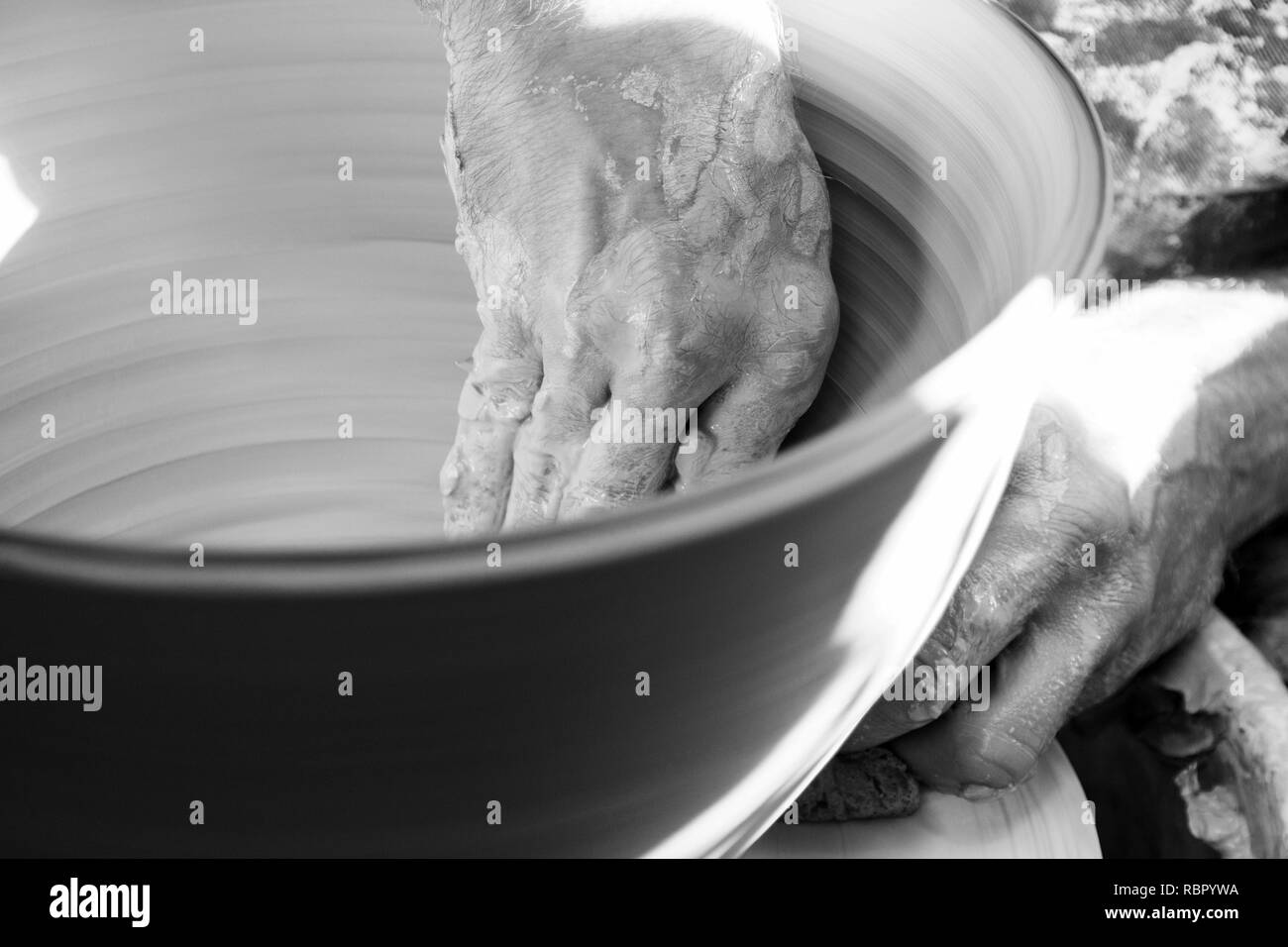 Artist potter working in the sculpting ceramic vase. Hands