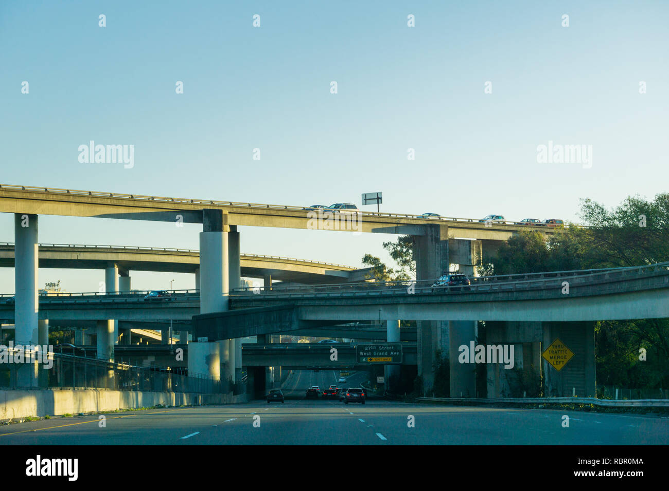 Freeway multilevel junction at sunset, California Stock Photo Alamy