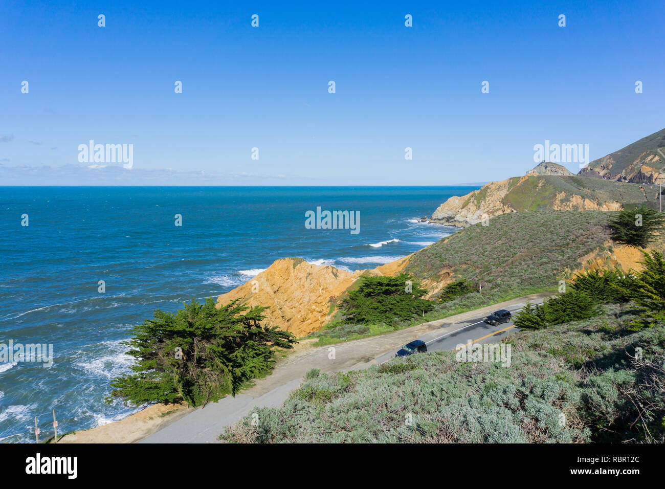 Aerial view of scenic highway on the Pacific Ocean coast, Devil's Slide ...