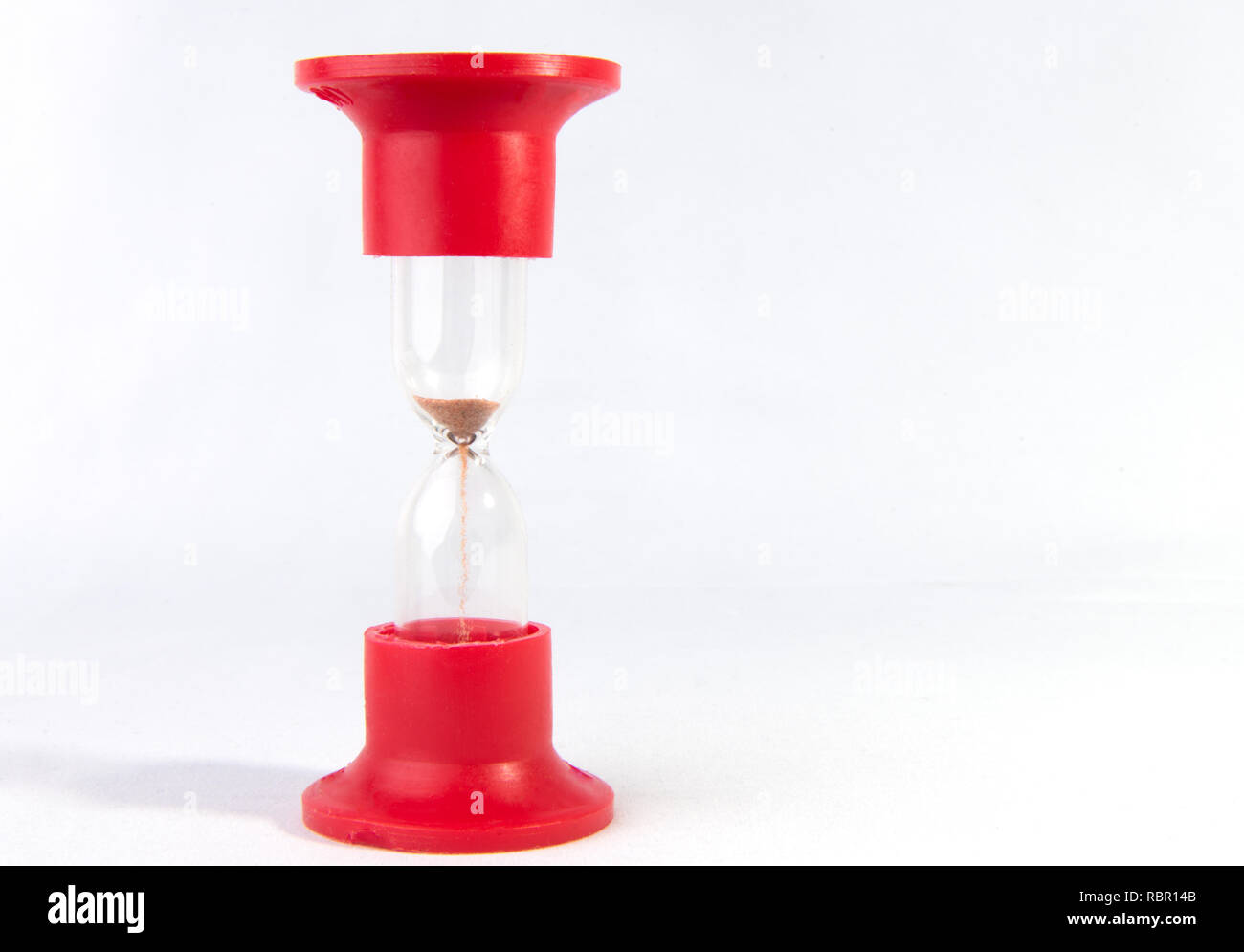 Sand clock isolated on white background Stock Photo Alamy