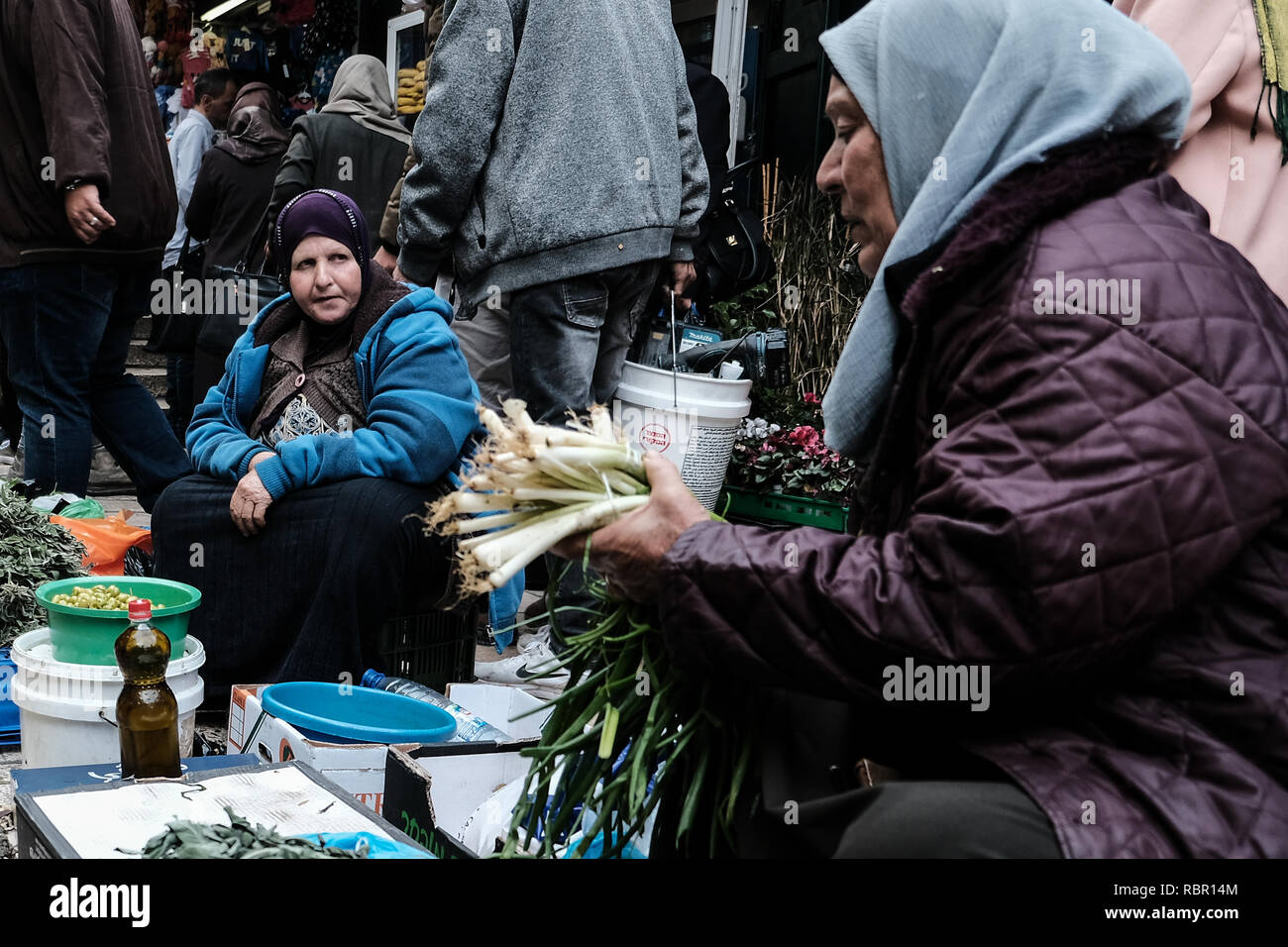 Vendors sell agricultural produce on Al Wad or Hagai Street in the Old City's Muslim Quarter near the Damascus Gate. Stock Photo