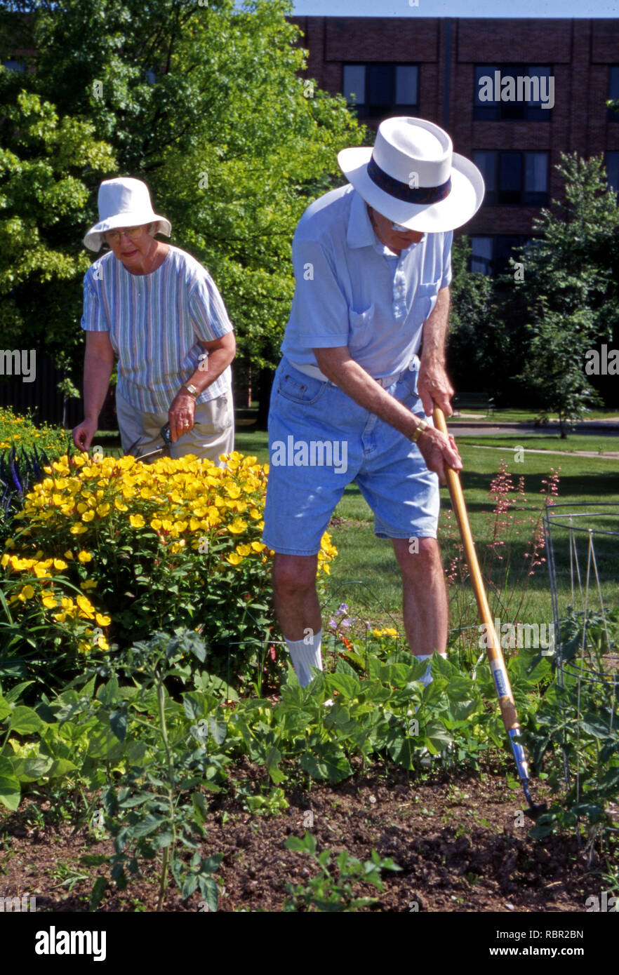the garden s assisted living on A Senior Citizen Couple Works In A Garden At An Assisted Living Facility Stock Photo Alamy