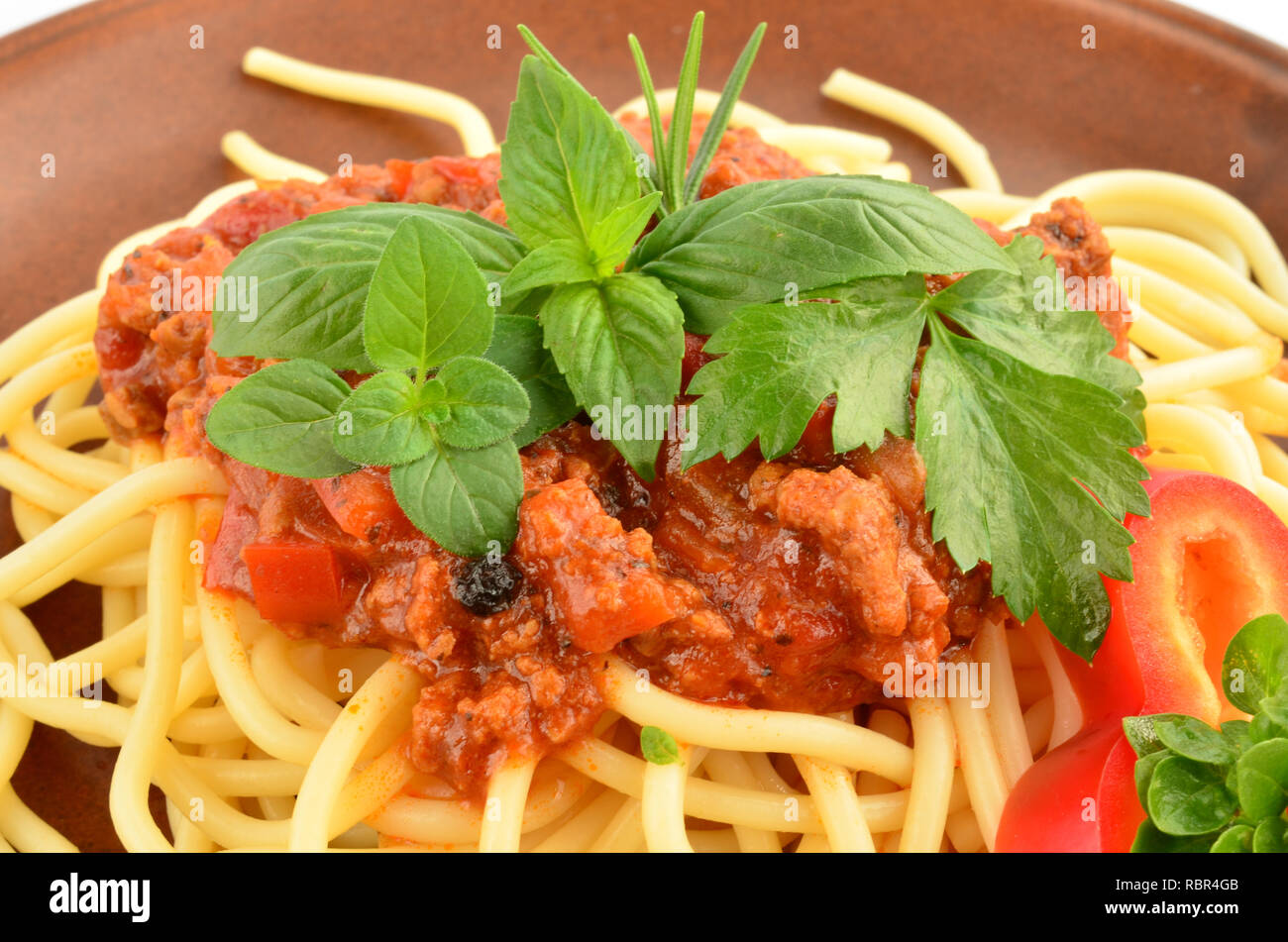 Plate with spaghetti bolognese and basil leaf hires stock photography and images Alamy