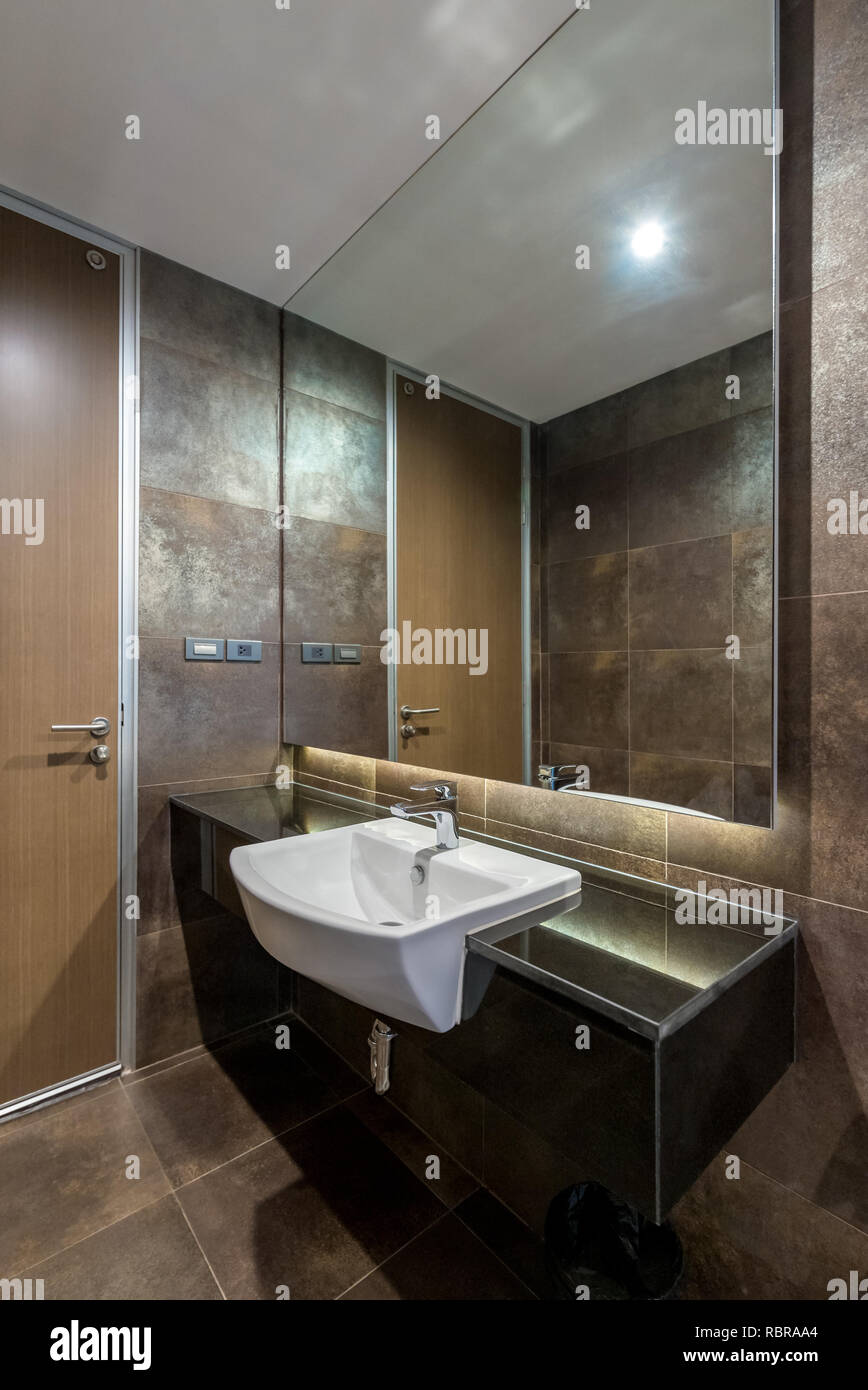 Interior of a modern bathroom with sink Stock Photo - Alamy