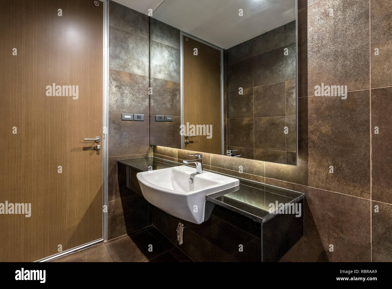 Interior of a modern bathroom with sink Stock Photo - Alamy